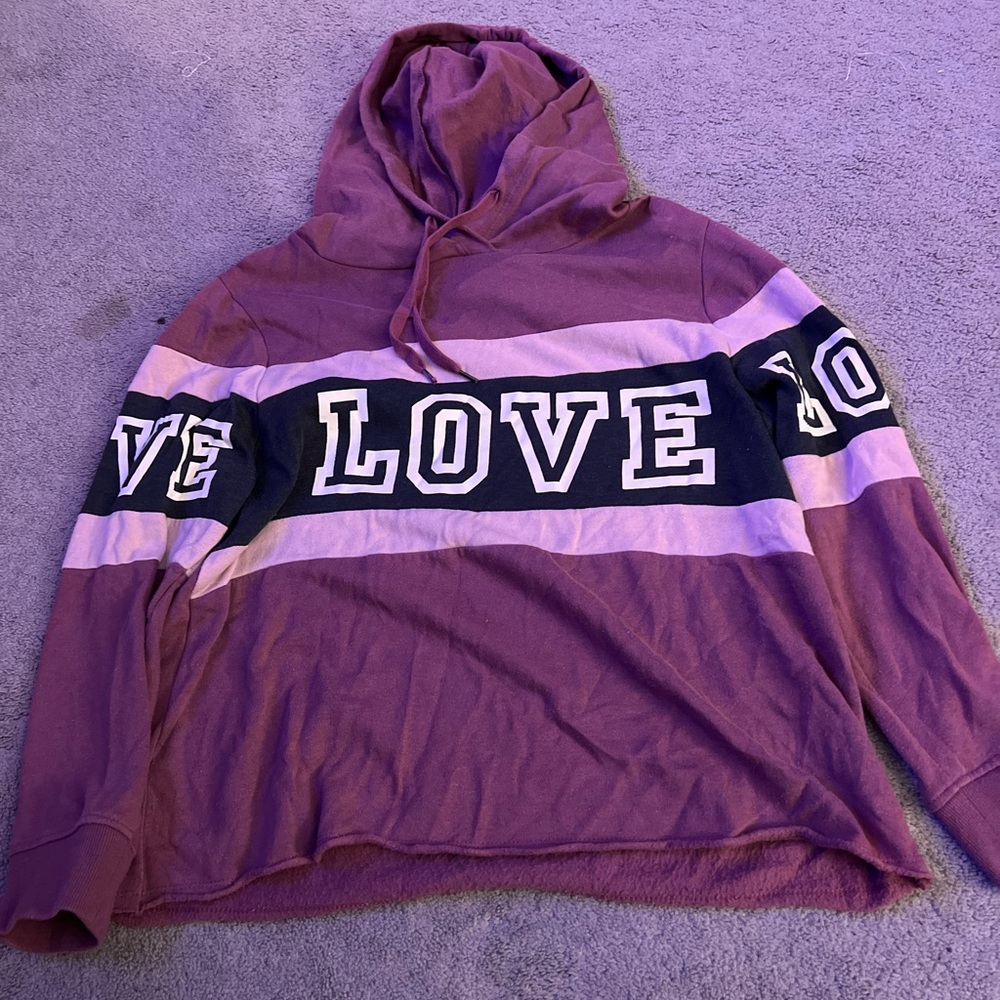 size large, pink with black and white wording